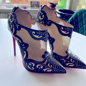 Louboutin size 38